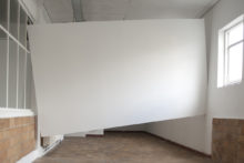 Roeland Tweelinckx, Displaced wall at Netwerk Aalst, 2014, Wood, plasterboard and its surroundings, Variable dimensions