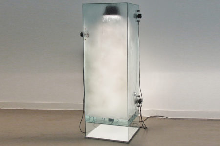 Donato Piccolo, Hurricane (Reversible), 2010, Glass, demineralized water, ventilators, ultrasonic nebulizer, halogen lamps, electrical system, microphone, speaker, 170 x 50 x 50 cm, George-Kolbe Museum, Berlin (DE)